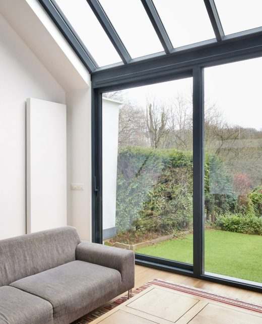 Modern,Living,Room,With,Large,Windows,And,View,On,Seaside.